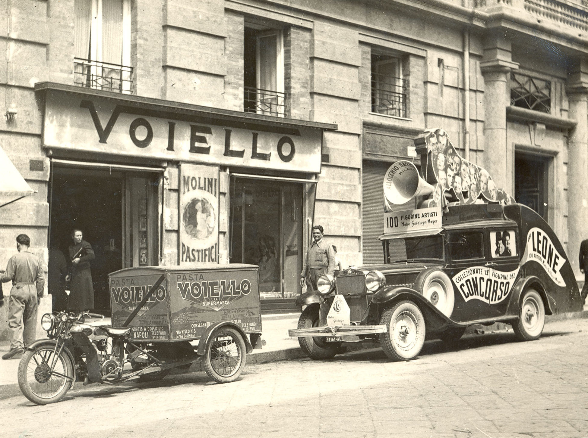 An advertising motorcycle branded Voiello in front of a point of sale of the Twenties